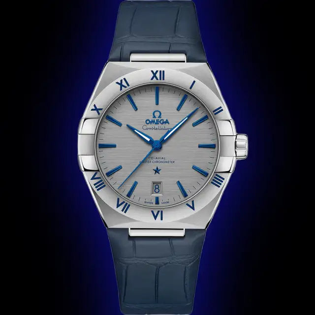 Omega Constellation 131.13.39.20.06.002 men's automatic watch, 39mm stainless steel case, grey dial, blue leather strap – front view on dark background