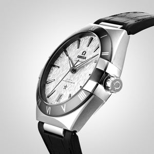 Omega Constellation 131.33.41.21.06.001 men's automatic watch, 41mm stainless steel case, grey dial, black leather strap – angle view on grey background