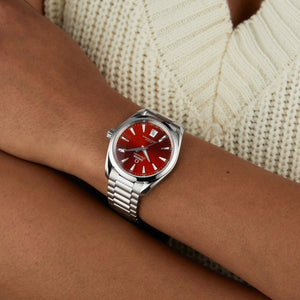 Omega Seamaster Aqua Terra Shades 220.10.38.20.13.003 automatic watch, 38mm stainless steel case, terracotta dial, steel bracelet – on wrist close-up