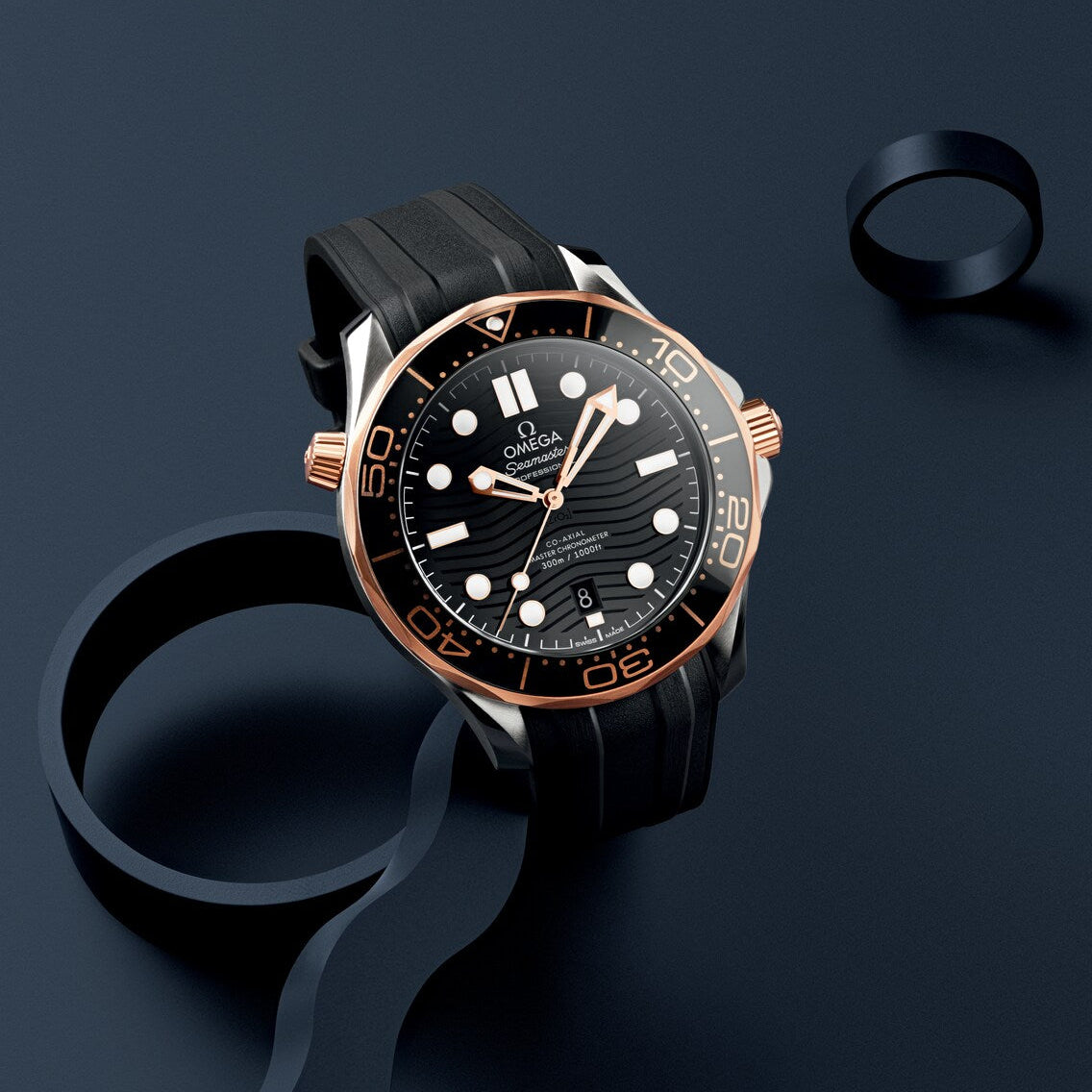 Omega Seamaster Diver 300M 210.22.42.20.01.002 men's automatic watch, steel and Sedna gold, black dial, black rubber strap – lifestyle view