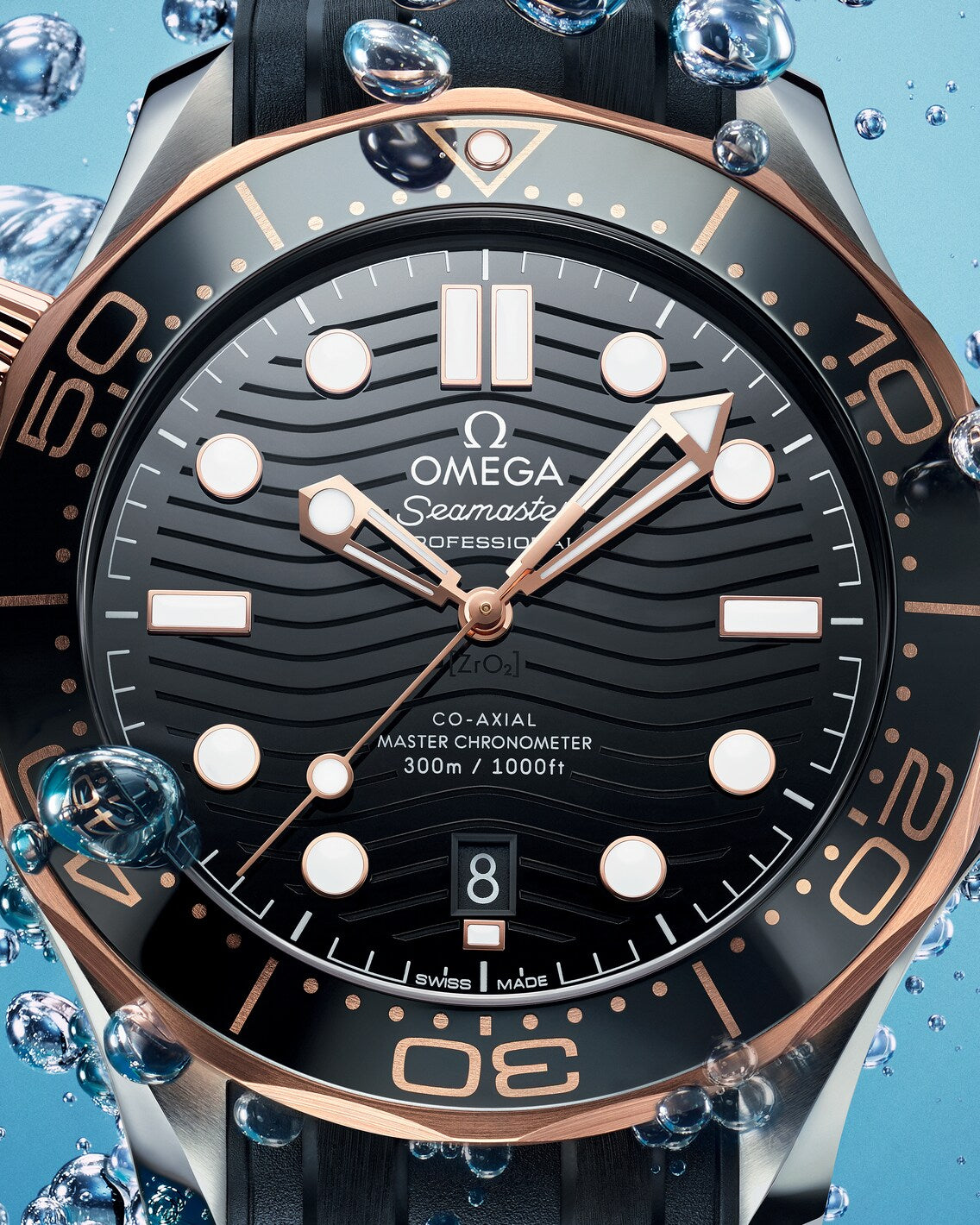 Omega Seamaster Diver 300M 210.22.42.20.01.002 men's automatic watch – black ceramic wave dial and Sedna gold bezel close-up