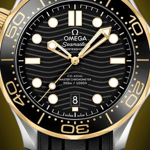 Omega Seamaster Diver 300M men's automatic watch, 42mm steel and yellow gold case, black dial, black rubber strap – dial close-up