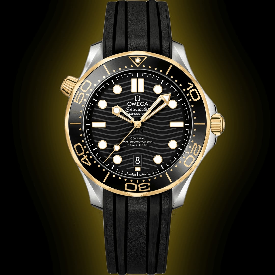 Omega Seamaster Diver 300M men's automatic watch, 42mm steel and yellow gold case, black dial, black rubber strap – front view on dark background