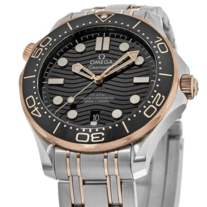 Omega Seamaster Diver 300M men's automatic watch, 42mm steel and rose gold case, black dial, two-tone bracelet – dial close-up