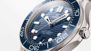 Omega Seamaster Diver 300M men's automatic watch, 42mm stainless steel case, blue dial, steel bracelet – side angle view
