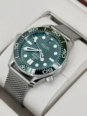 Omega Seamaster Diver 300M men's automatic watch, 42mm stainless steel case, green dial, mesh bracelet – front view in box