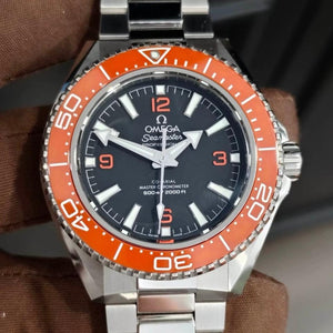 Omega Seamaster Planet Ocean 600M 217.30.42.21.01.003 men's automatic watch – hand-held view of black dial and orange bezel