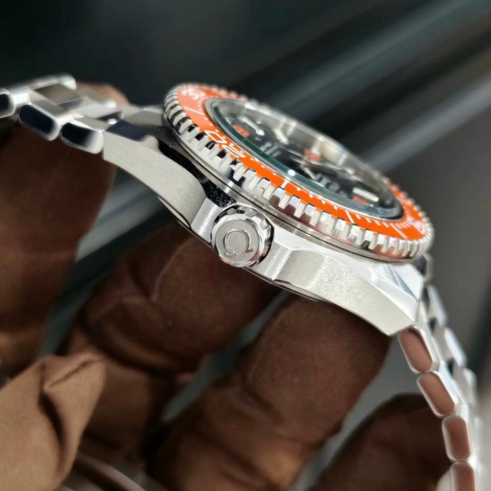Omega Seamaster Planet Ocean 600M 217.30.42.21.01.003 men's automatic watch – orange ceramic bezel and crown side view