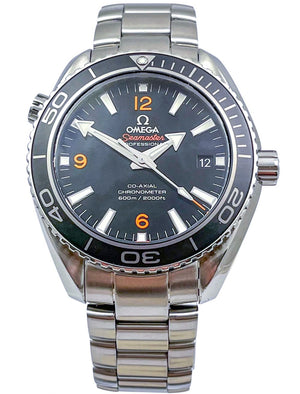 Omega Seamaster Planet Ocean 600M men's quartz watch, 42mm stainless steel case, black dial with orange numerals, steel bracelet – dial close-up