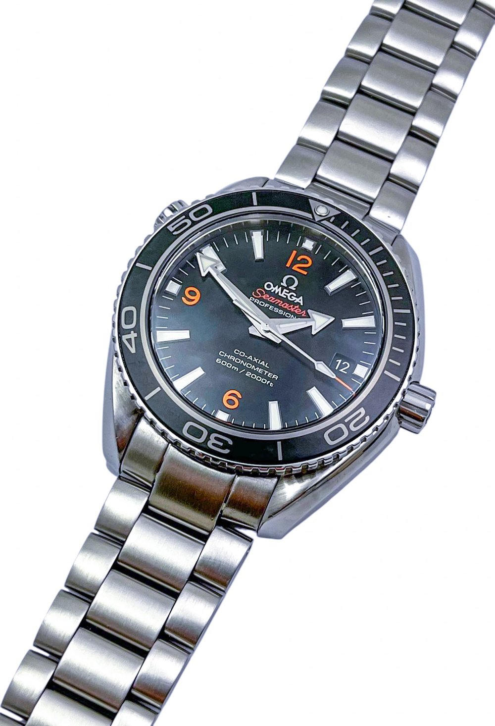 Omega Seamaster Planet Ocean 600M men's quartz watch, 42mm stainless steel case, black dial with orange numerals, steel bracelet – left angle view