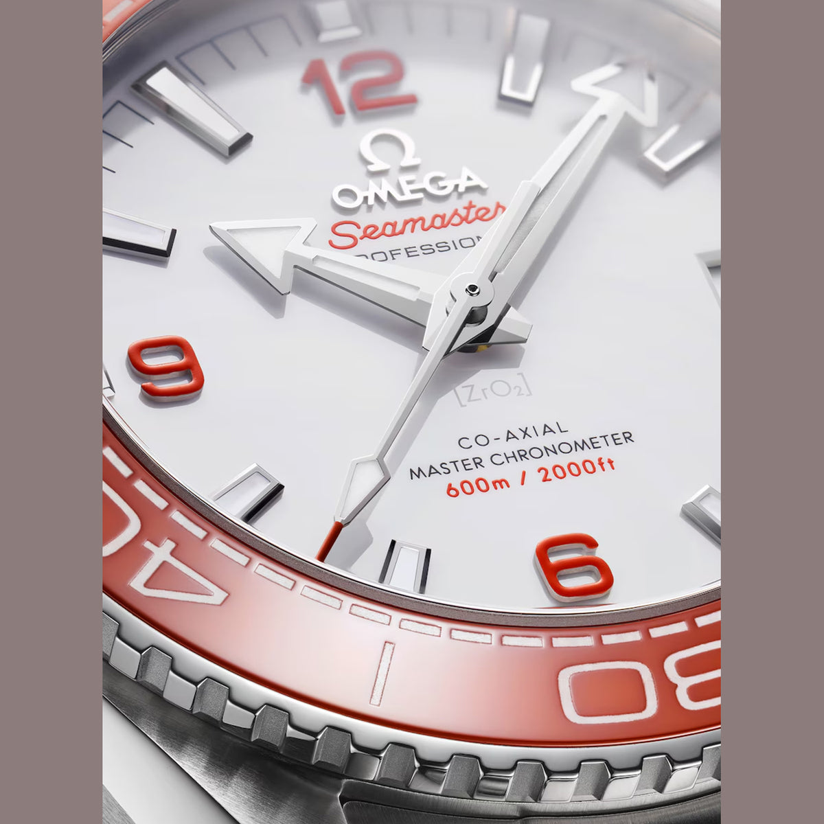 Omega Seamaster Planet Ocean men's automatic watch, 43.5mm stainless steel case, white dial, orange bezel, steel bracelet – dial close-up