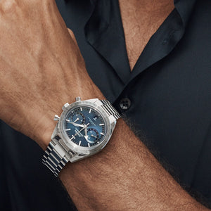 Omega Speedmaster '57 332.10.41.51.03.001 men's chronograph watch, blue dial, steel bracelet – on wrist view