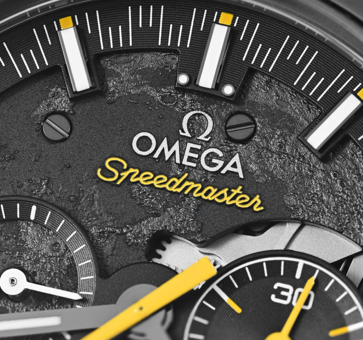Omega Speedmaster Dark Side of the Moon Style men's chronograph watch, 45mm black case, black dial with yellow accents, black leather strap – dial close-up