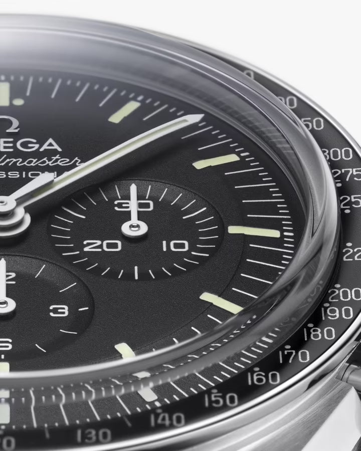 Omega Speedmaster Professional Moonwatch men's chronograph watch, 42mm stainless steel case, black dial, steel bracelet – dial angle close-up