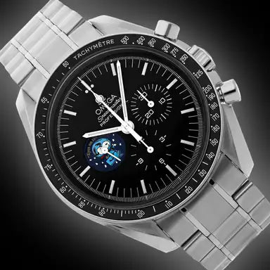 Omega Speedmaster Professional Snoopy men's chronograph watch, 42mm stainless steel case, black dial with Snoopy medallion, steel bracelet – dial close-up on dark background