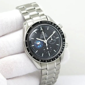 Omega Speedmaster Professional Snoopy men's chronograph watch, 42mm stainless steel case, black dial with Snoopy medallion, steel bracelet – hand-held view