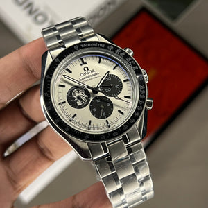 Omega Speedmaster Snoopy Award men's chronograph watch, 42mm stainless steel case, white dial with black subdials, steel bracelet – hand-held view
