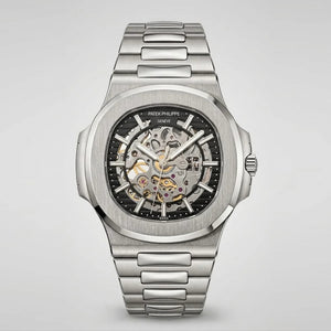Patek Philippe Nautilus 40mm Men's Automatic Watch – Black Skeleton Dial & Silver Stainless Steel Strap | ساعة باتيك فيليب نوتيلس رجالي مينا أسود مفرغة