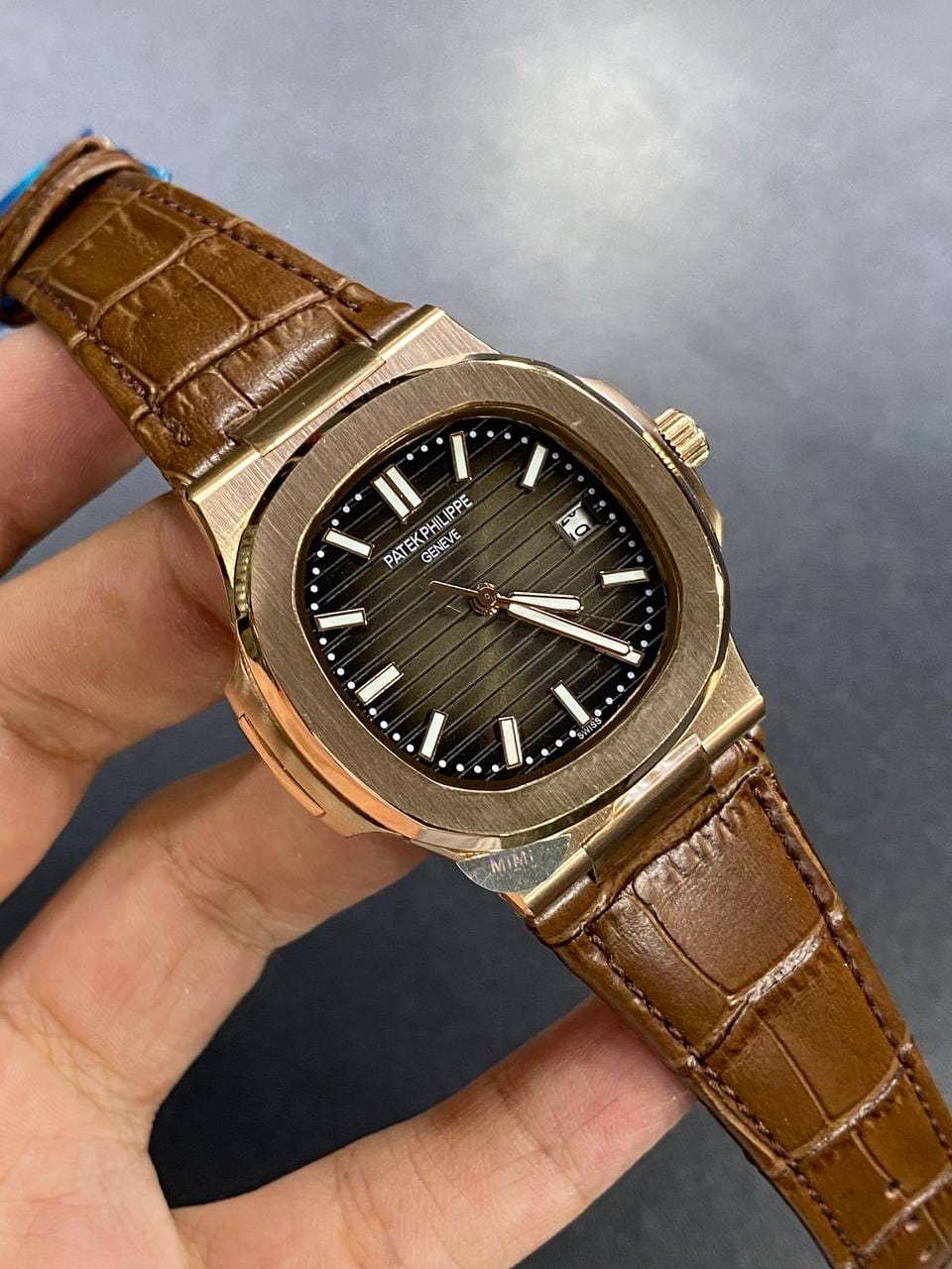Patek Philippe Nautilus 40mm Men's Automatic Watch – Brown Dial, Rose Gold Case & Brown Leather Strap | ساعة باتيك فيليب نوتيلس رجالي مينا بني