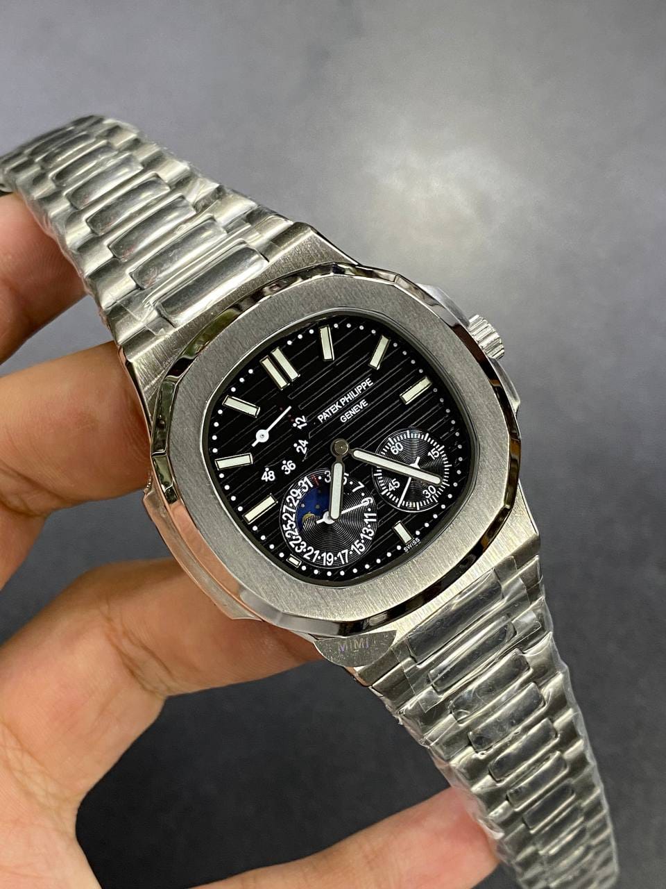 Patek Philippe Nautilus Moon Phase 40mm Men's Automatic Watch – Black Dial & Silver Stainless Steel Strap | ساعة باتيك فيليب نوتيلس رجالي مينا أسود