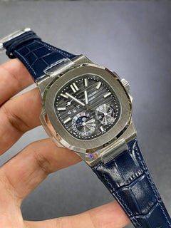 Patek Philippe Nautilus Moon Phase 40mm Men's Automatic Watch – Blue Dial, Silver Case & Blue Leather Strap | ساعة باتيك فيليب نوتيلس رجالي مينا أزرق