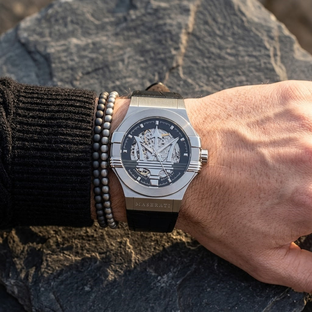 Close up of Maserati Potenza R8821108031 men's automatic watch on wrist showing skeleton dial and black leather strap