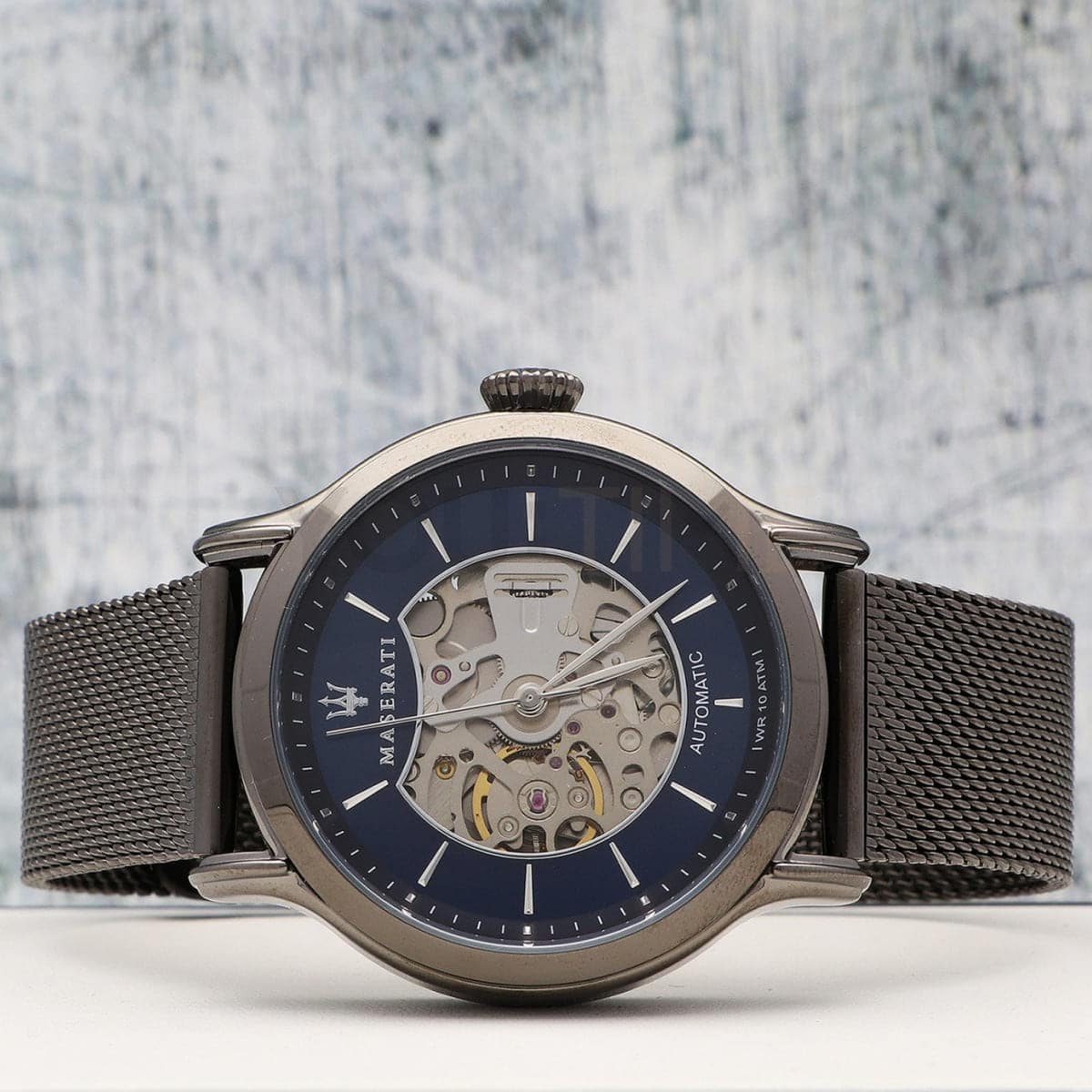 Live photo of Maserati Epoca R8823118006 automatic watch showing actual gunmetal finish and deep blue sunray dial