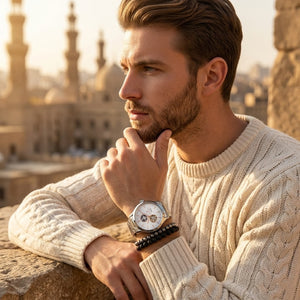 Elegant man wearing Maserati Tradizione R8823125001 automatic watch with silver case and luxury open heart dial