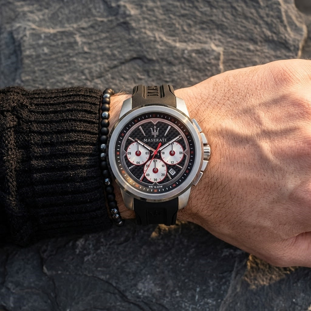 Close up of Maserati Sfida R8851123001 men's quartz battery watch on wrist showing carbon fiber racing dial and silver-tone case