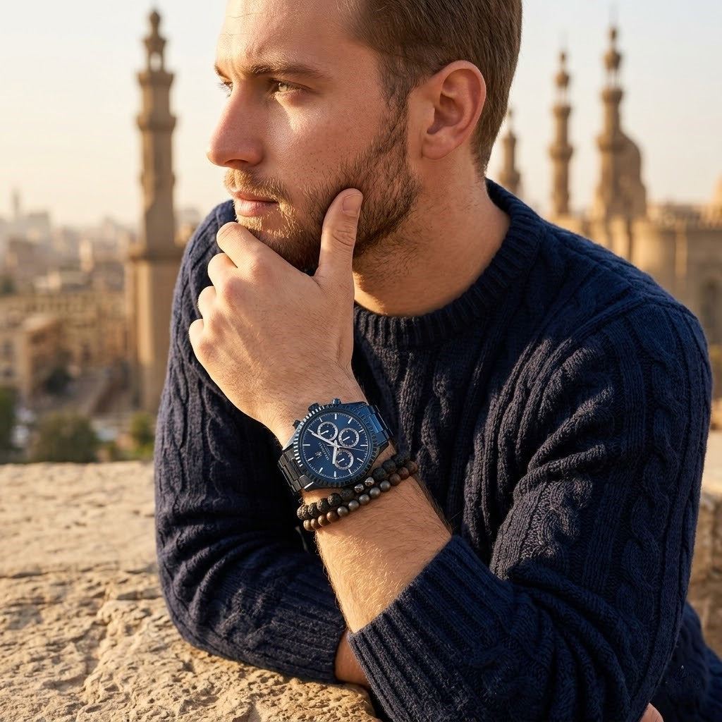 Elegant man wearing Maserati Competizione Blue Edition R8853100025 men's quartz battery watch with full blue case and luxury textured dial