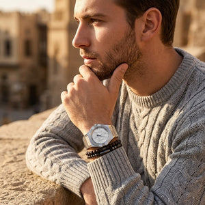 Elegant man wearing Maserati Potenza Corse R8853108002 men's quartz battery watch with silver case and luxury silver dial