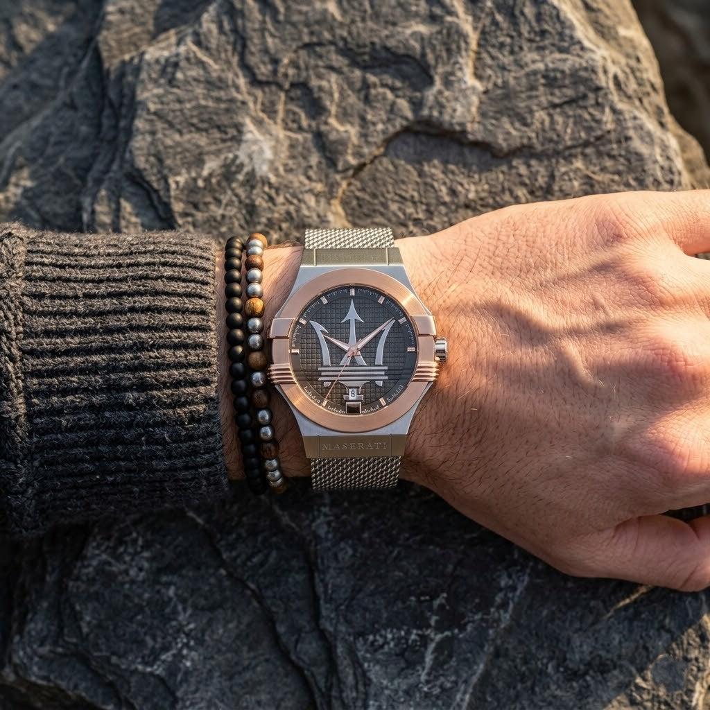 Close up of Maserati Potenza R8853108007 men's quartz battery watch on wrist showing iconic gray dial and rose gold bezel