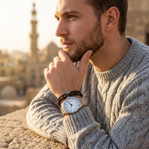 Elegant man wearing Maserati Circuito R8853127001 men's quartz battery watch with silver case and luxury silver dial