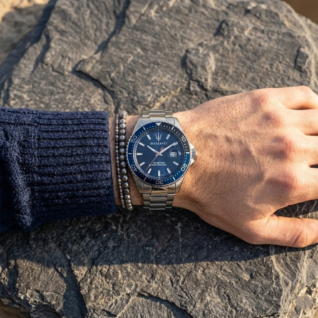 Close up of Maserati Sfida R8853140001 men's quartz battery watch on wrist showing blue gradient dial and silver metal bracelet