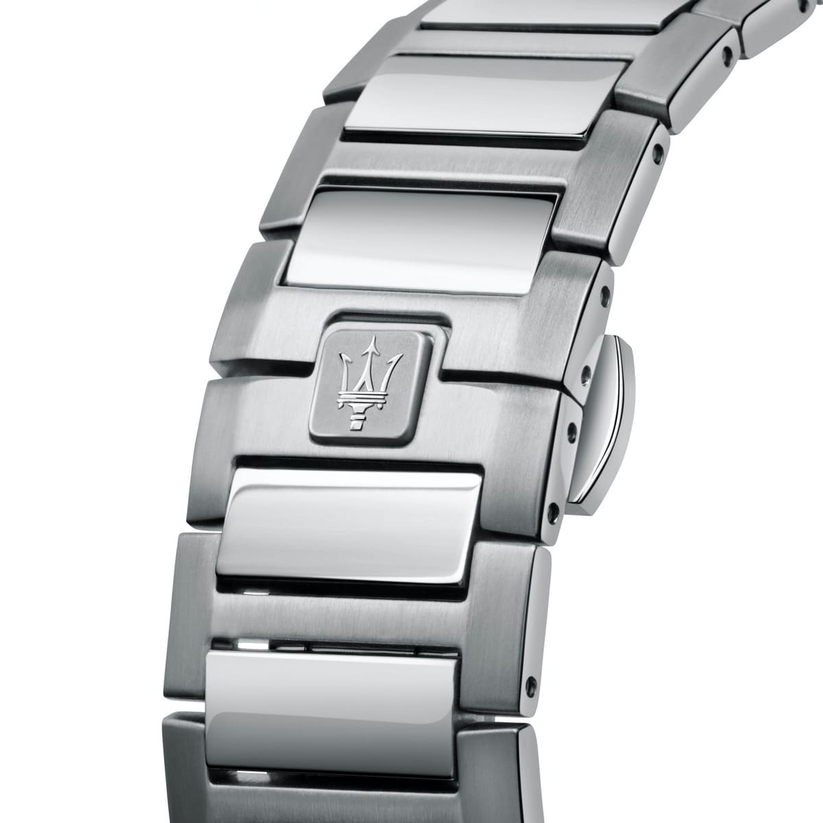 Close-up of a silver watch band with a brand logo 