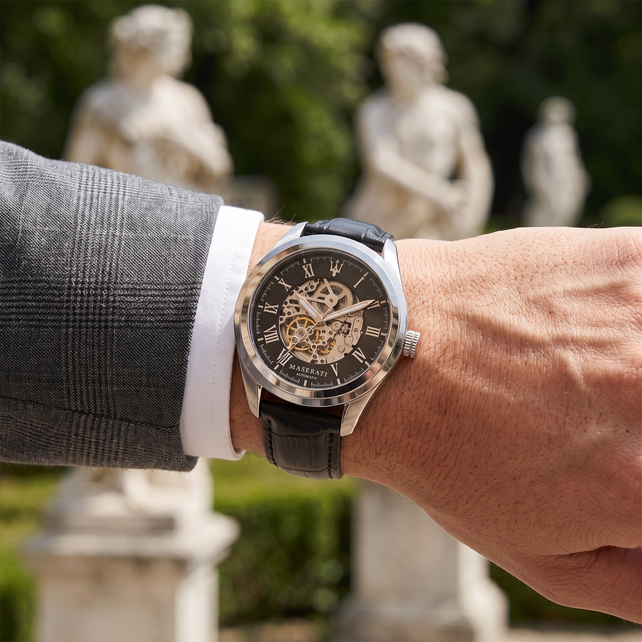 Live wrist shot of the Maserati Traguardo R8871612001 automatic watch with black leather strap.