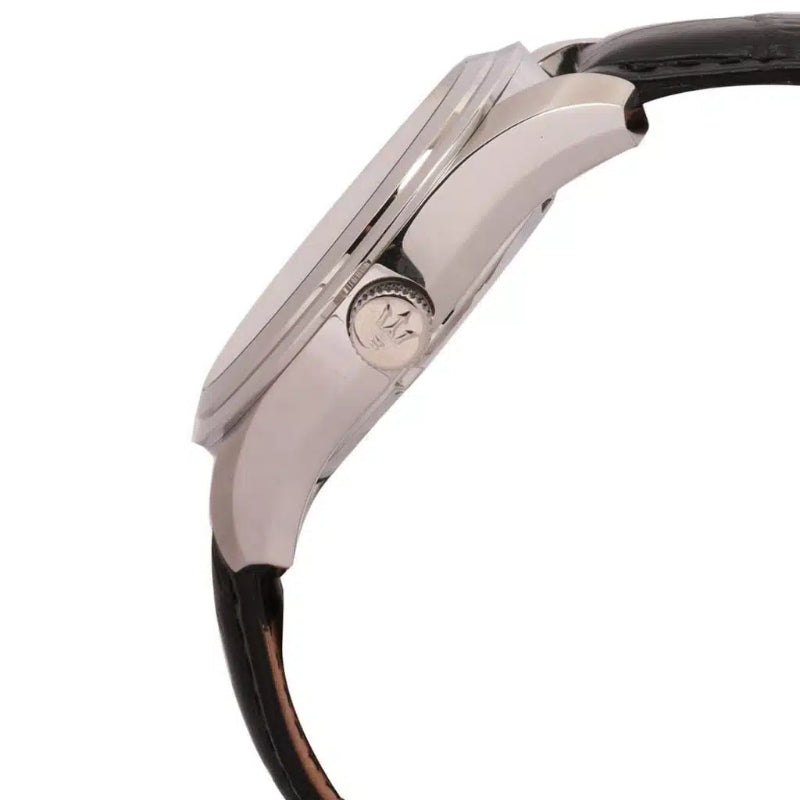 Close-up side view of a wristwatch with a polished silver-tone metal case and a dark brown leather strap on a white background.