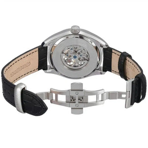 Watch with black strap and visible mechanical components on a white background