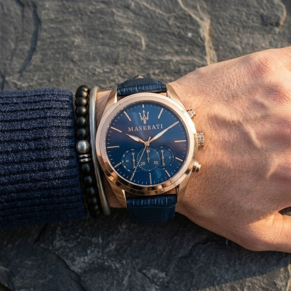 Close up of Maserati Traguardo R8871612015 men's quartz battery watch on wrist showing blue sunray dial and blue leather strap