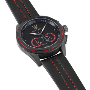 Detailed side view of the black PVD crown and racing-inspired chronograph buttons on the R8871612023