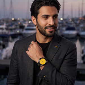Lifestyle luxury shot featuring the Maserati Traguardo R8871612045 men's chronograph watch.