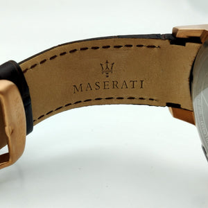 Close-up of a Maserati watch strap on a white background