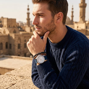 Elegant man wearing Maserati Successo R8871621013 men's quartz battery watch with silver-tone case and sporty blue rubber strap