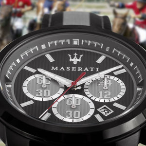 Maserati watch with a blurred background of people and horses