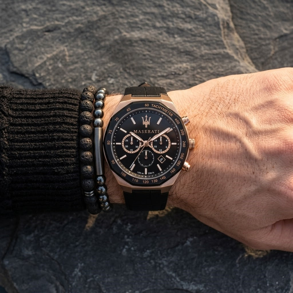 Close up of Maserati Stile Chronograph R8871642001 men's quartz battery watch on wrist showing black dial and luxury rose gold accents