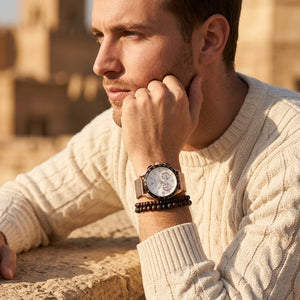 Elegant man wearing Maserati Traguardo R8873612011 men's quartz battery watch with rose gold case and luxury white racing dial
