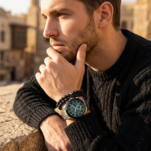 Elegant man wearing Maserati Traguardo R8873612060 men's quartz battery watch with silver case and luxury green skeleton dial