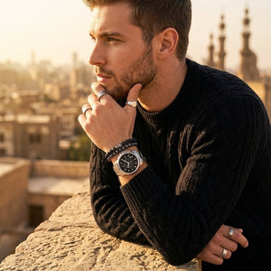 Elegant man wearing Maserati Successo R8873621001 men's quartz battery watch with silver-tone case and sporty black dial