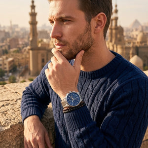 Elegant man wearing Maserati Sorpasso R8873624004 men's quartz battery watch with silver-tone case and luxury blue dial