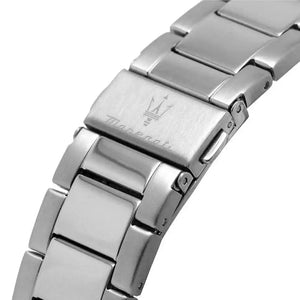 Close-up of a silver watch band with brand logo on a white background